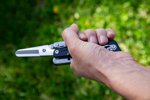 knife scissors in hand
