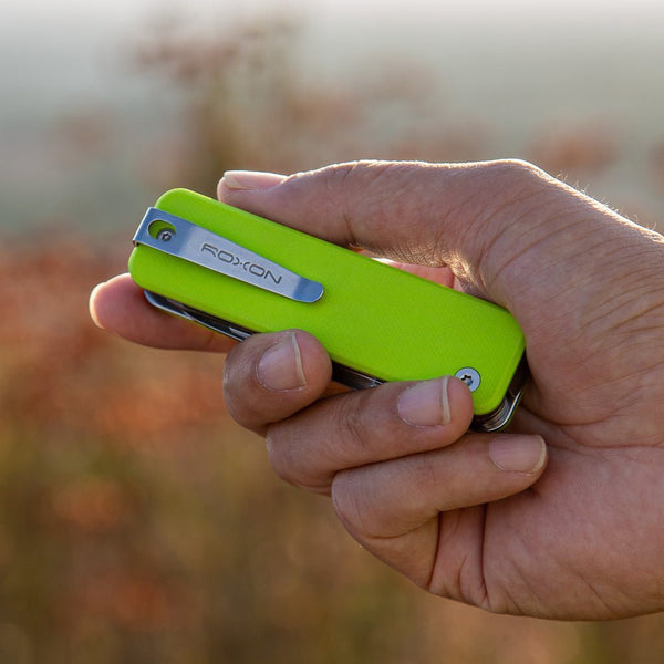 Hand Holding the new Neon green Flex Companion