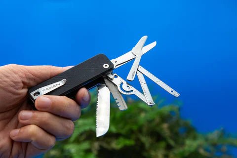 Flex Companion built to form a fishing tool, with implements on display against a blue background.