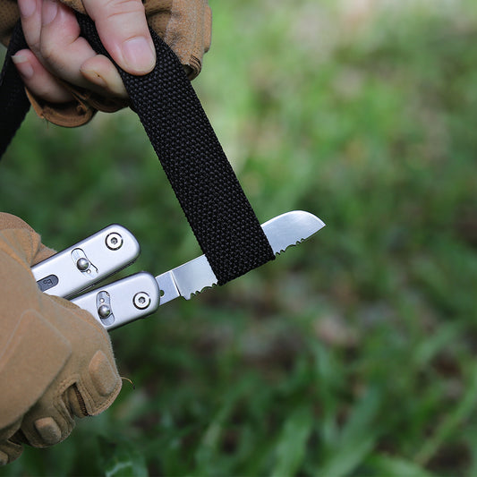 Using multitool knife to cut rope