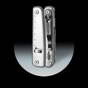 Multitool with ruler and various tools on a black background