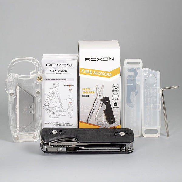 Roxon multi-tool with packaging on a gray background