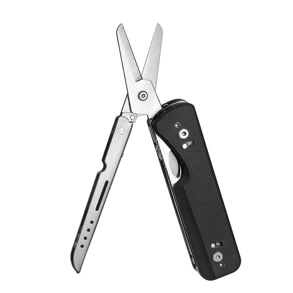 Multitool with scissors and knife blade on a white background