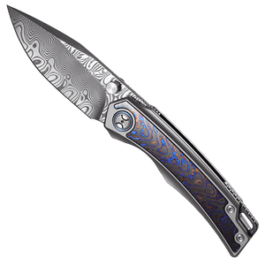 Folding knife with decorative handle on a white background