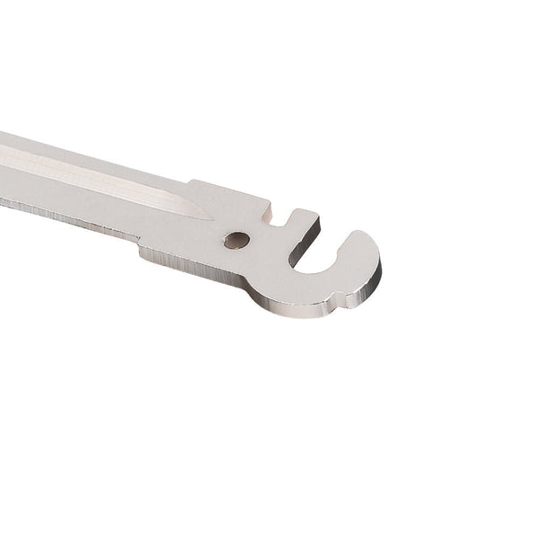 Metallic wrench on a white background